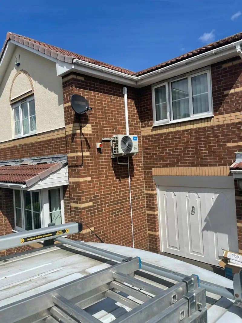 Outdoor air conditioning unit installed on a Manchester home