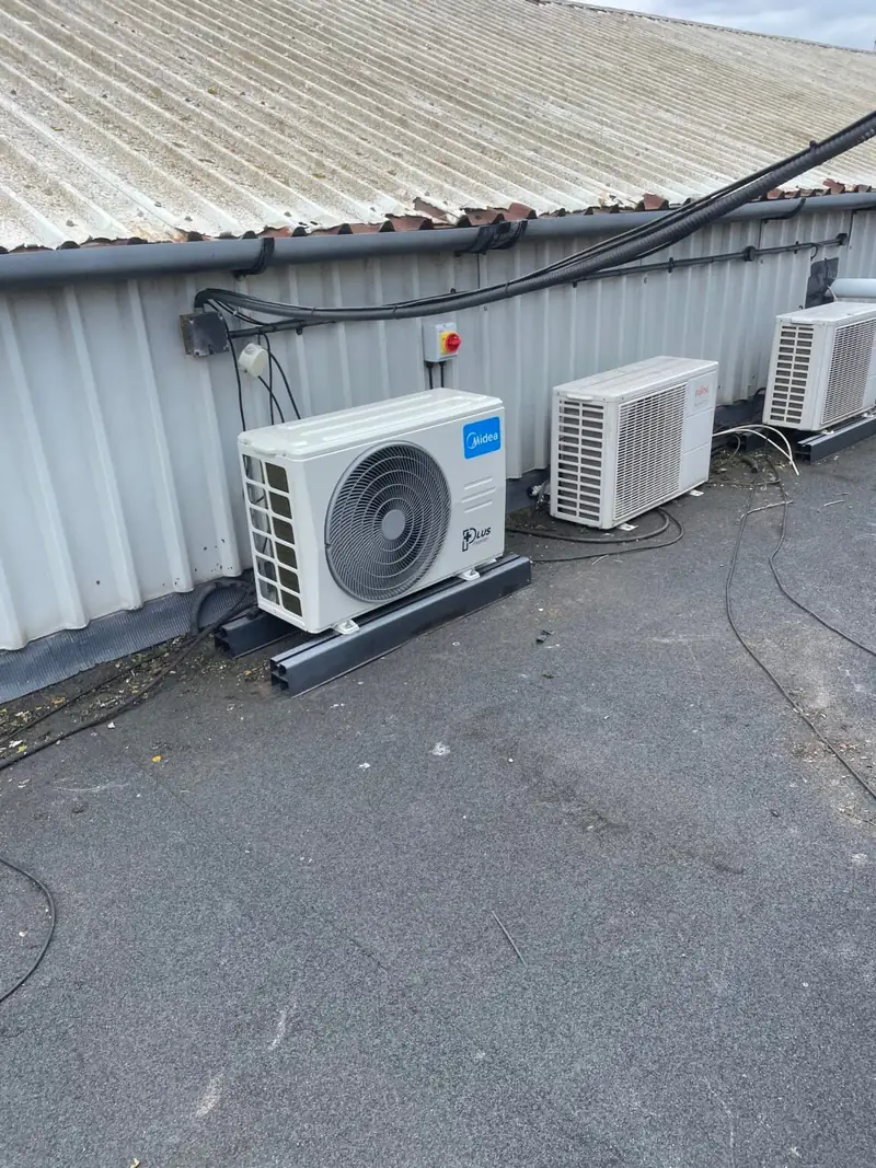 Commercial air conditioning condensers on a business yard